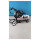 Central Pneumatic Airbrush Compressor. Plugged in