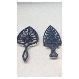 2 Cast Iron Trivets.   Left 9.5', Right 9' &