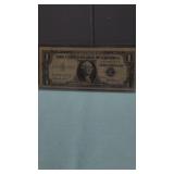 1957  $1 Blue Seal Silver Certificate in Plastic