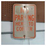 No Parking Here to Corner Sign