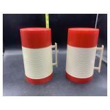 2 plastic Aladdin thermos