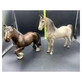 2 plastic horses