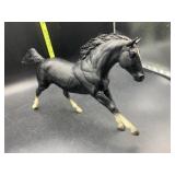 Breyer horse - black with white legs