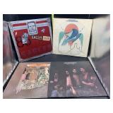 3 eagles & 1 Aerosmith vinyl record albums