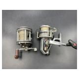 Sl2 d-a-m & 1 other fishing reels