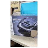 Robotic Pool Cleaner for in Ground Pools.     Has