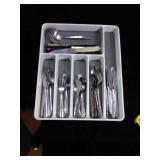 Large  silverware tray with set of flateware.