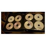Large lot of DVDs in Case, Binder