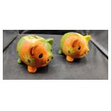 2 Piggy Banks. Both have Rubber Stoppers