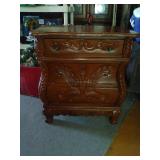 Nice carved 3 drawer ended table. Bottom drawer