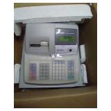 Sharp electronic cash register with keys.