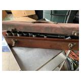 Red metal toolbox with misc tools