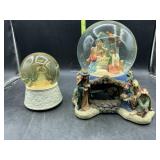 2 religious snow globes - both musical