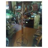 Nice wooden coat rack. Needs tightened. 6ft tall.