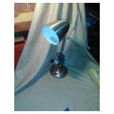 Nice stainless flexible desk lamp. Working.