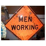 Men Working Road Sign