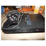 PlayStation 2 Console and 1 controller & card.
