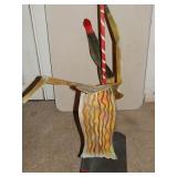 Iron Stripper on Pole Sculpture - by Dick Manlin