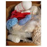 Crochet Items, Needles, Yarn.