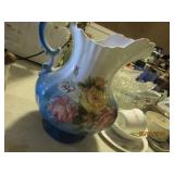Blue & White Pitcher with Roses - has a chip on
