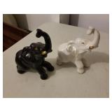 2 elephant figures