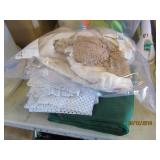 Green Tablecloth and Small Doilies