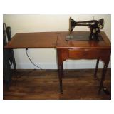 Singer Electric Sewing Machine in Cabinet