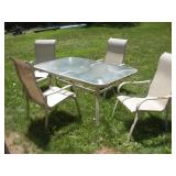Glass Patio Table W/4 Chairs  66x40x28 Inches