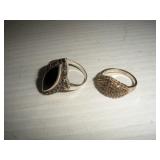 (2) Sterling Silver Rings  7 grams  size 4 & 8