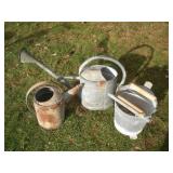 Galvanized watering cans and mop bucket