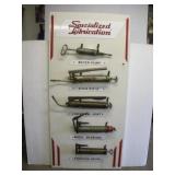 Porcelain Lubrication Sign on Painted Metal