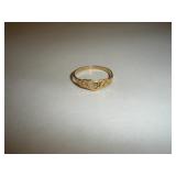 10 KARAT GOLD RING SIZE 5 1/2 , .66 GRAMS