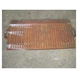 28 IN CAST IRON GRIDDLE (IN NEED OF ATTN)