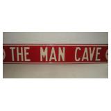 MAN CAVE METAL SIGN 32X6