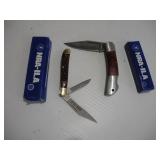 (2) NRA STONE RIVER FOLDING KIVES