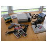 VINTAGE NINTENDO W/ GAMES AND CONTROLLERS