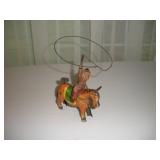 VINTAGE TIN WIND UP TOY COWBOY AND LASSO