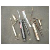 GREASE GUNS