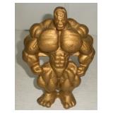 VINTAGE METAL MUSCLEMAN DOOR STOPPER 7 INCH TALL