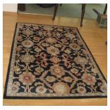 7 BY 5 SURYA WOOL AREA RUG NEEDS CLEANED