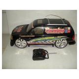 NEW BRIGHT RC ESCALADE W/ REMOTE & BATTERY - -