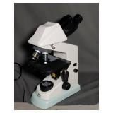 Nikon Eclipse E100 microscope with power supply