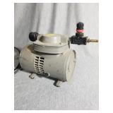 Thomas vacuum diaphragm pump model 905CA18, with