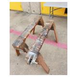 Pair of sturdy saw horses, vice grip attached to