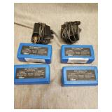 Four Gilian BDX II battery packs