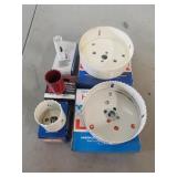 Five hole saws of assorted sizes