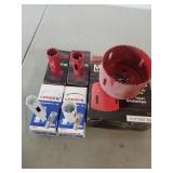 Set of five hole saws, all in original boxes