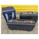 Two hardshell briefcases and a softshell carrying