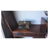 Vintage kenmore sewing machine with gold out table