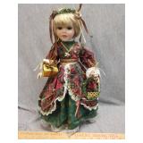 Porcelain holiday doll, commemorates 1998